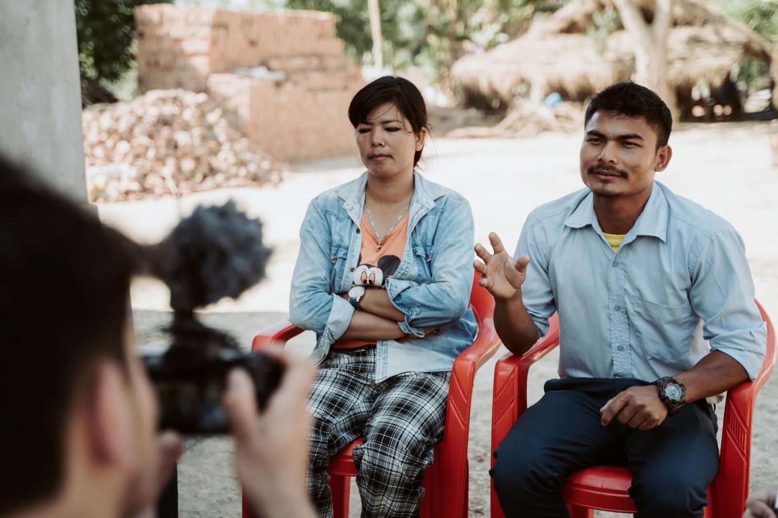 Couple giving interview on camera