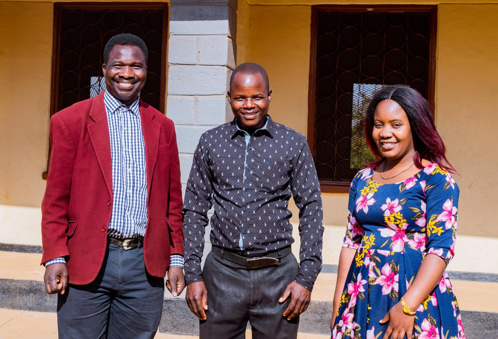 VSO volunteer Theo, teacher Peter and VSO volunteer Prisca.