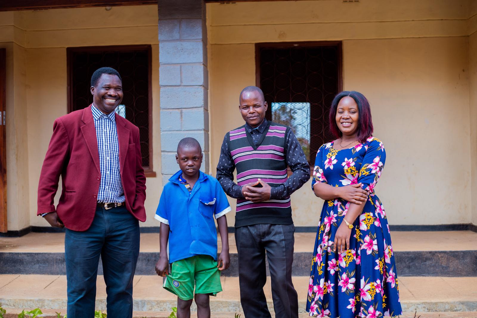 VSO volunteer Theo, student Thoko, teacher Peter and VSO volunteer Prisca.