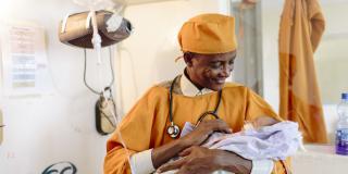 A doctor with a newborn baby in Ethiopia