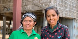 Two fisherwomen, Samngath and Thorn, smiling