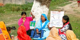 National volunteers in Nepal explaining about Depo-Provera shots to local women in Gaur municipality.