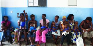 Mothers with their babies waiting at a clinic in Sierra Leone | VSO