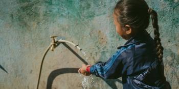 Students washing their hands at Shree Nepal National Community Secondary School, Surkhet