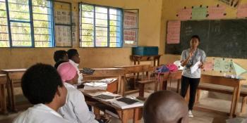 Volunteer Jessica Sucgang mentoring trainee teachers, Rwanda