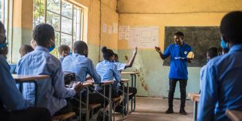 Teacher teaching school kids