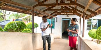 Disability inclusion officers inspect a ramp