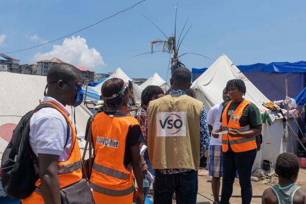 Volunteers engaging with the community to coordinate disaster response