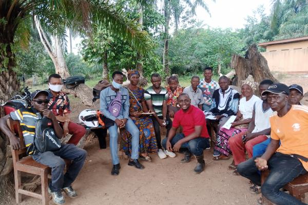 Michael with Class 1 teachers at a learning exchange visit. Ngiehun.