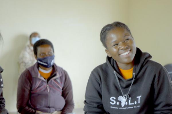 community volunteers listen to a training session