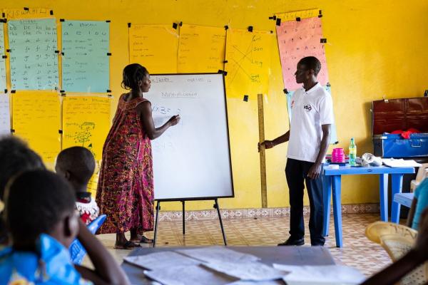 Peter supports teacher Christine