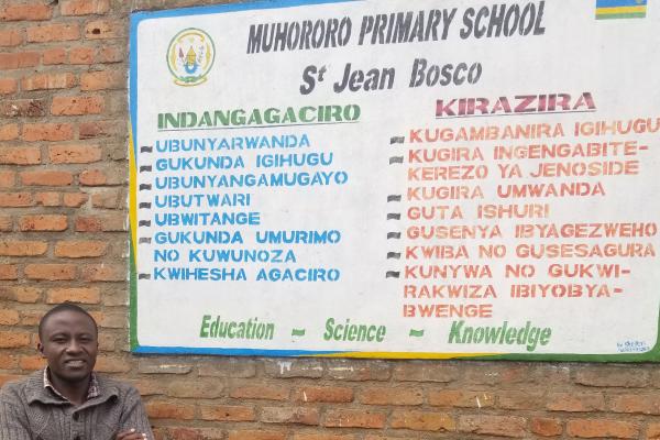 Dennis outside primary school