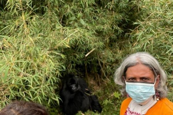 Deanna and Bornali take a selfie with a gorilla at a national park