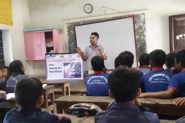 Dev conducting child club orientation at Rankhani Secondary School, Baglung, Nepal.