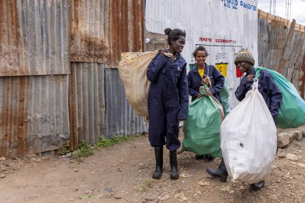 Waste workers in Kenya wearing PPE