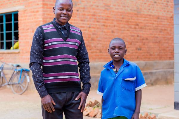 Teacher Peter and student Thoko.