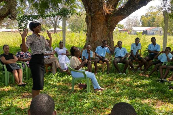 Lucy delivers presentation to children