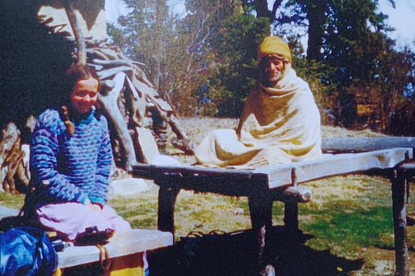 Anna with local holy man in 1980s