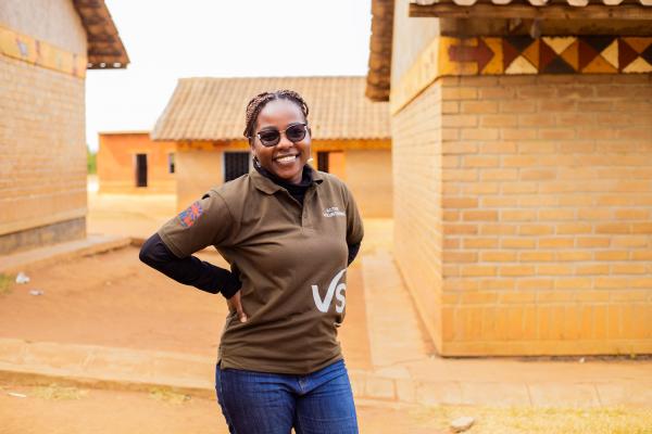 VSO staff member, Wezzie, at a primary school.